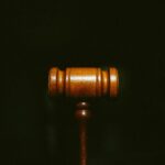 brown wooden stand with black background